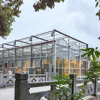 Steel Flame Multi Span Greenhouse Commercial Glass Greenhouse With Winter Cover And Hydroponic System